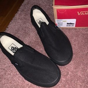 black slip on vans .